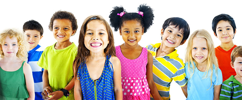 The image shows a group of children with diverse skin tones, wearing colorful clothing, posing for a photo against a white background.